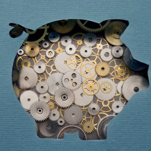Financial savings mechanism Financial savings mechanism. Piggy bank formed by gears and cogs